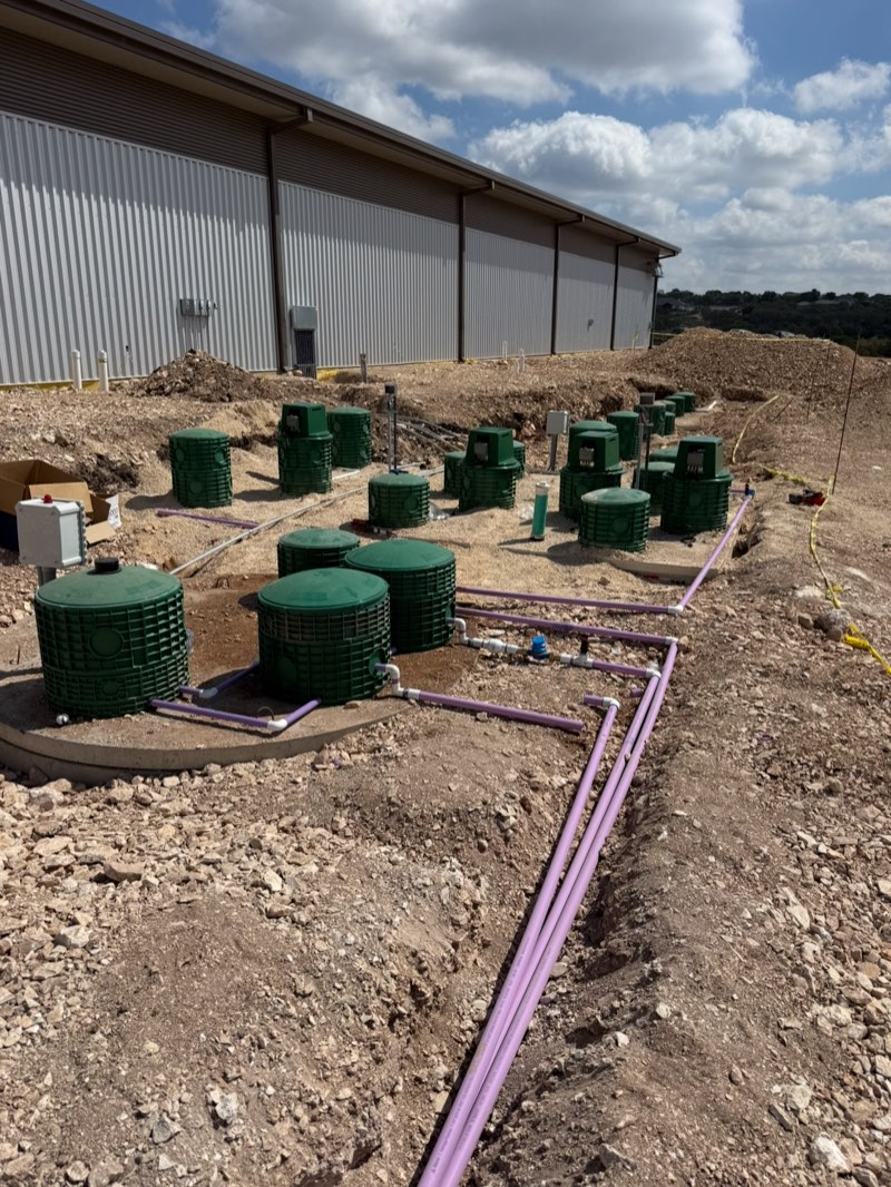 Commercial septic system with purple drip lines