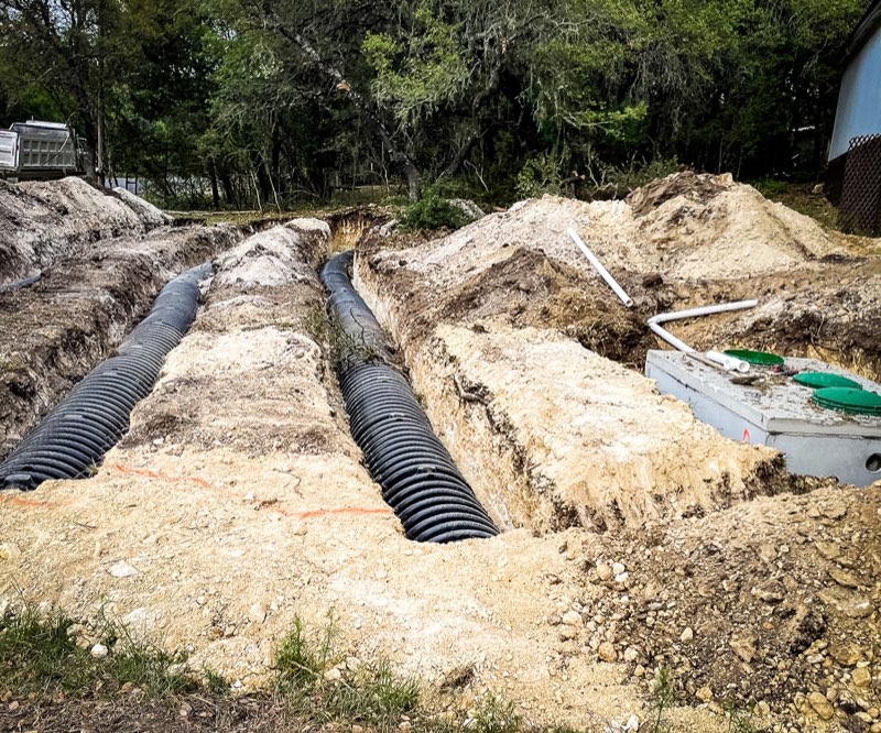Conventional drainfield trenches with pipe