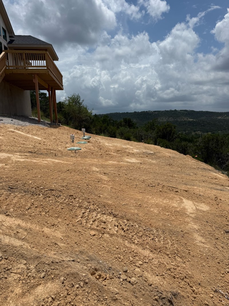 Graded septic field on a hillside